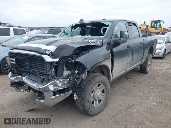 ✅ 2023 Ram 2500 Tradesman • VIN: 3C6UR5CL0PG614831 • Лот: 41367939. Опубликован ранее на IAAI с пробегом 70 439 миль. Бесплатный доступ к архиву аукционных продаж из США и подробный отчёт об истории автомобиля на DreamBid. Изображение 2.