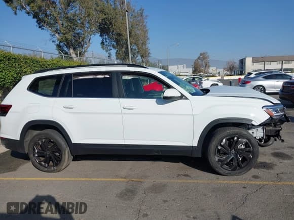 ✅ 2023 Volkswagen Atlas SE • VIN: 1V2WP2CA6PC533984 • Lot: 41021512. Listed on IAAI with 26,993 mi. Free auction sales archive from the USA and detailed vehicle history report at DreamBid. Image 13.