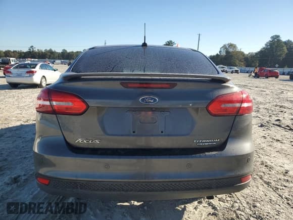 ✅ 2015 Ford Focus Titanium • VIN: 1FADP3J26FL304137 • Lot: 89453055. Wystawiony na Copart z przebiegiem 128 815 mil. Bezpłatny archiwum sprzedaży aukcyjnych z USA i szczegółowy raport historii pojazdu na DreamBid. Zdjęcie 6.