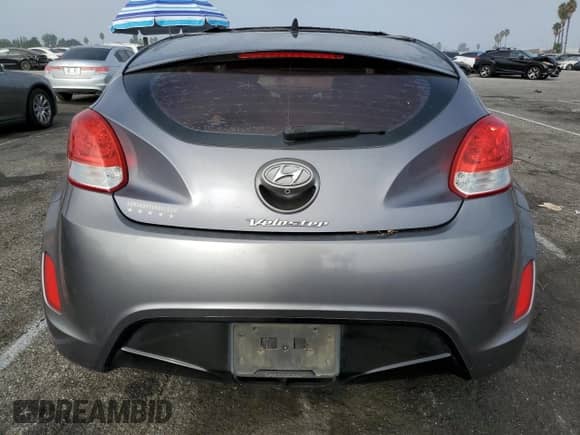 2016 Hyundai Veloster z VIN KMHTC6AD9GU260582, wystawiony jako Copart lot #71878294 z przebiegiem 83 155 mil mil oraz Szkoda całkowita • Salvage title. Historia ofert i sprzedaży dostępna na DreamBid. Obrazek 6.
