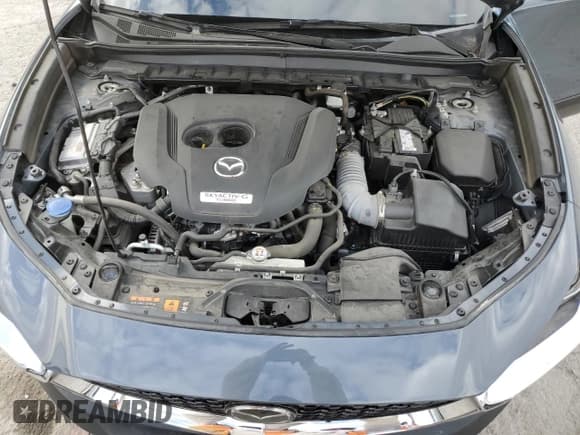 ✅ 2022 Mazda CX-30 2.5 Turbo • VIN: 3MVDMBAY8NM447233 • Lot: 85157134. Listed on Copart with 29,560 mi. Free auction sales archive from the USA and detailed vehicle history report at DreamBid. Image 12.