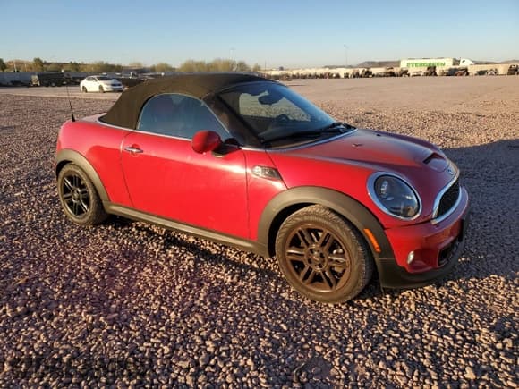 ✅ 2015 MINI Roadster S • VIN: WMWSY3C57FT595590 • Lot: 87748725. Listed on Copart with 72,494 mi. Free auction sales archive from the USA and detailed vehicle history report at DreamBid. Image 4.