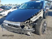 ✅ 2022 Tesla Model Y Performance • VIN: 7SAYGDEF3NF405901 • Lot: 43473548. Listed on IAAI with 23,024 mi. Free auction sales archive from the USA and detailed vehicle history report at DreamBid. Image 6.