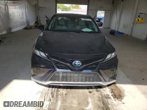 2021 Toyota Camry Hybrid XSE с VIN 4T1K31AK7MU554815, выставлен на аукционе Copart как лот 70532715 с пробегом 37 021 миль миль и Списание • Salvage title. История ставок и продаж доступна на DreamBid. Изображение 5.