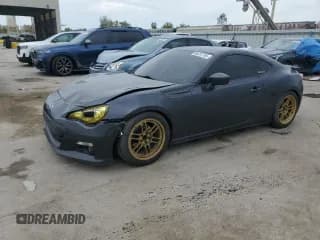 ✅ 2014 Subaru BRZ Limited • VIN: JF1ZCAC19E9604812 • Lot: 86281785. Listed on Copart with 107,007 mi. Free auction sales archive from the USA and detailed vehicle history report at DreamBid. Image 1.