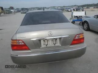 ✅ 2002 Acura RL • VIN: JH4KA96532C008414 • Лот: 71397774. Опубликован ранее на Copart с пробегом 176 293 миль. Бесплатный доступ к архиву аукционных продаж из США и подробный отчёт об истории автомобиля на DreamBid. Изображение 6.