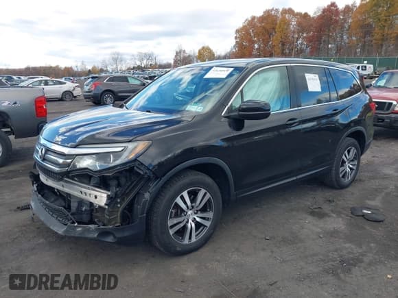 ✅ 2017 Honda Pilot EX-L • VIN: 5FNYF6H58HB037329 • Lot: 43630810. Listed on IAAI with 107,157 mi. Free auction sales archive from the USA and detailed vehicle history report at DreamBid. Image 17.
