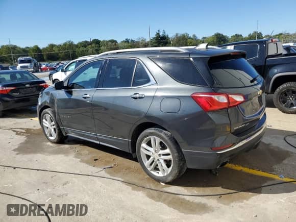2018 Chevrolet Equinox Premier z VIN 2GNAXNEX5J6229633, wystawiony jako Copart lot #85733235 z przebiegiem 71 508 mil mil oraz Szkoda całkowita • Salvage title. Historia ofert i sprzedaży dostępna na DreamBid. Obrazek 2.