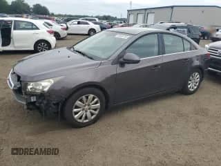 2011 Chevrolet Cruze 1LT с VIN 1G1PF5S9XB7111289, выставлен на аукционе Copart как лот 66905785 с пробегом 107 249 миль миль и Списание • Salvage title. История ставок и продаж доступна на DreamBid. Изображение 1.