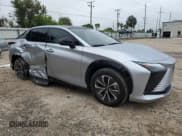 ✅ 2024 Lexus RZ 300e Premium • VIN: JTJABABB2RA000668 • Lot: 71710714. Listed on Copart with 9,387 mi. Free auction sales archive from the USA and detailed vehicle history report at DreamBid. Image 4.