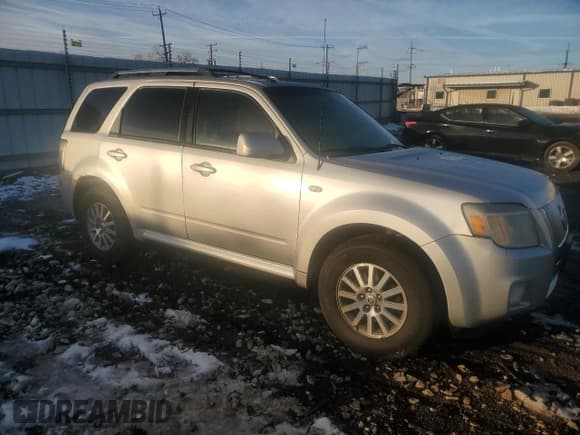 ✅ 2009 Mercury Mariner Premier • VIN: 4M2CU97G19KJ05442 • Lot: 91672915. Listed on Copart with 205,871 mi. Free auction sales archive from the USA and detailed vehicle history report at DreamBid. Image 4.