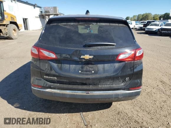 ✅ 2018 Chevrolet Equinox LT • VIN: 2GNAXJEV6J6350677 • Лот: 82306565. Опубликован ранее на Copart с пробегом 69 321 миль. Бесплатный доступ к архиву аукционных продаж из США и подробный отчёт об истории автомобиля на DreamBid. Изображение 6.