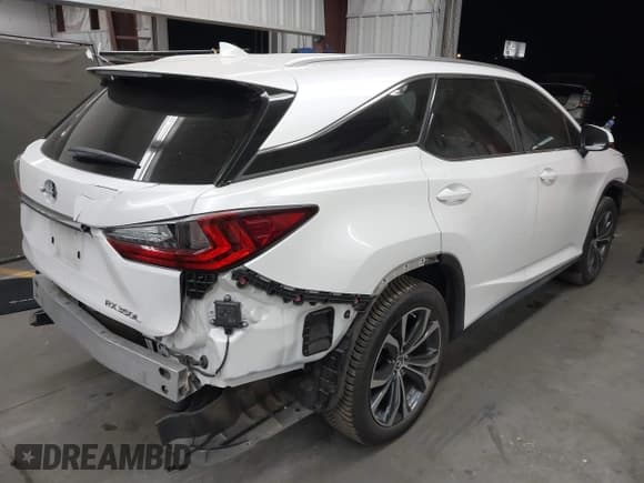 ✅ 2018 Lexus RX 350L Premium • VIN: JTJGZKCA3J2003885 • Лот: 42381977. Опубликован ранее на IAAI с пробегом 76 823 миль. Бесплатный доступ к архиву аукционных продаж из США и подробный отчёт об истории автомобиля на DreamBid. Изображение 4.