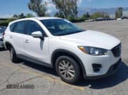 ✅ 2016 Mazda CX-5 Sport • VIN: JM3KE2BY5G0793032 • Lot: 42128706. Listed on IAAI with 52,010 mi. Free auction sales archive from the USA and detailed vehicle history report at DreamBid. Image 1.