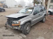 ✅ 2002 Jeep Grand Cherokee • VIN: 1J8GX48S42C147018 • Lot: 43589496. Listed on IAAI with 192,014 mi. Free auction sales archive from the USA and detailed vehicle history report at DreamBid. Image 2.