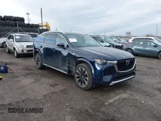 ✅ 2024 Mazda CX-90 S Premium • VIN: JM3KKDHCXR1121478 • Лот: 41439936. Опубликован ранее на IAAI с пробегом Не указан. Бесплатный доступ к архиву аукционных продаж из США и подробный отчёт об истории автомобиля на DreamBid. Изображение 1.