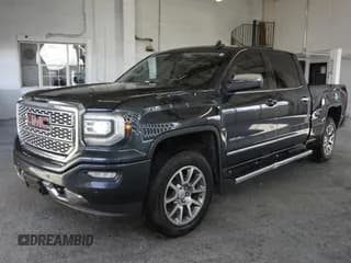 ✅ 2017 GMC Sierra 1500 Denali • VIN: 3GTU2PEJ2HG410828 • Лот: 64327225. Опубликован ранее на Copart с пробегом 124 361 миль. Бесплатный доступ к архиву аукционных продаж из США и подробный отчёт об истории автомобиля на DreamBid. Изображение 1.
