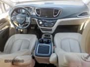 ✅ 2021 Chrysler Pacifica Hybrid Touring L • VIN: 2C4RC1L73MR594706 • Лот: 69829955. Опубликован ранее на Copart с пробегом 70 903 миль. Бесплатный доступ к архиву аукционных продаж из США и подробный отчёт об истории автомобиля на DreamBid. Изображение 8.