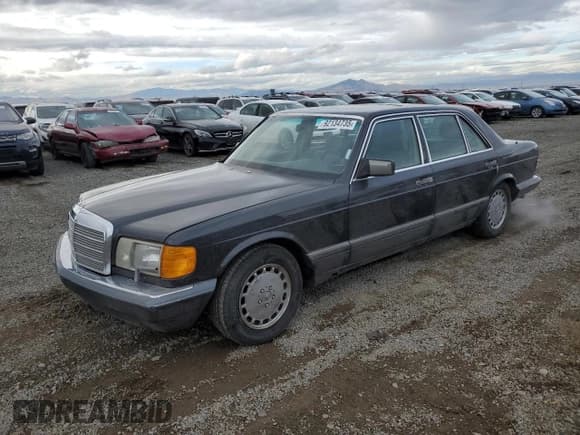 ✅ 1989 Mercedes-Benz 560 • VIN: WDBCA39E2KA467135 • Лот: 92134735. Опубликован ранее на Copart с пробегом 61 146 миль. Бесплатный доступ к архиву аукционных продаж из США и подробный отчёт об истории автомобиля на DreamBid. Изображение 1.