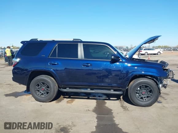 ✅ 2023 Toyota 4Runner SR5 • VIN: JTEEU5JR5P5304518 • Lot: 43508161. Listed on IAAI with 10,561 mi. Free auction sales archive from the USA and detailed vehicle history report at DreamBid. Image 12.