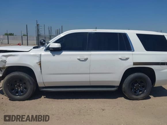 ✅ 2015 Chevrolet Tahoe Commercial • VIN: 1GNLC2ECXFR673084 • Lot: 41881353. Listed on IAAI with 256,096 mi. Free auction sales archive from the USA and detailed vehicle history report at DreamBid. Image 14.