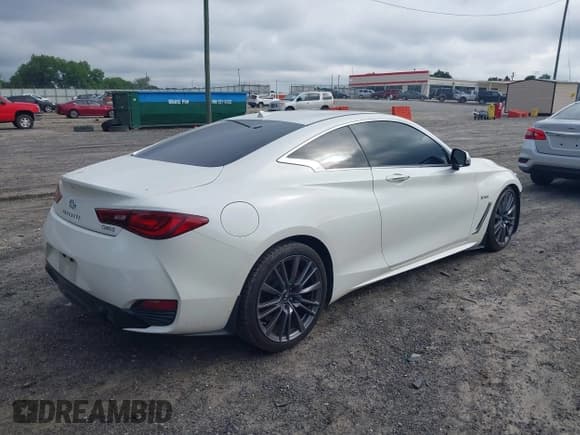✅ 2017 Infiniti Q60 Red Sport 400 • VIN: JN1FV7EK1HM610415 • Lot: 42493610. Listed on IAAI with 107,122 mi. Free auction sales archive from the USA and detailed vehicle history report at DreamBid. Image 4.