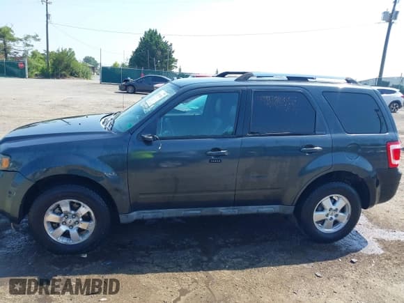 ✅ 2009 Ford Escape Limited • VIN: 1FMCU04739KB48262 • Lot: 42564760. Listed on IAAI with 175,058 mi. Free auction sales archive from the USA and detailed vehicle history report at DreamBid. Image 14.