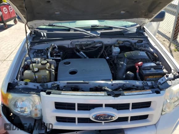 ✅ 2009 Ford Escape Hybrid • VIN: 1FMCU59319KA79008 • Lot: 49516745. Listed on Copart with 124,707 mi. Free auction sales archive from the USA and detailed vehicle history report at DreamBid. Image 12.