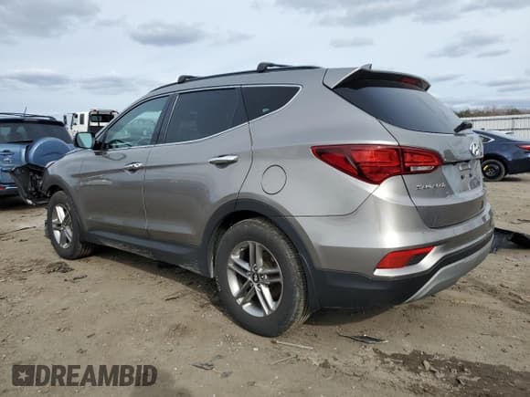 ✅ 2018 Hyundai Santa Fe 2.4L • VIN: 5NMZUDLB7JH101781 • Лот: 46034614. Опубликован ранее на Copart с пробегом 91 341 миль. Бесплатный доступ к архиву аукционных продаж из США и подробный отчёт об истории автомобиля на DreamBid. Изображение 2.