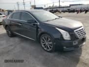 ✅ 2014 Cadillac XTS Livery • VIN: 2G61U5S37E9154590 • Лот: 79556784. Опубликован ранее на Copart с пробегом 143 858 миль. Бесплатный доступ к архиву аукционных продаж из США и подробный отчёт об истории автомобиля на DreamBid. Изображение 4.