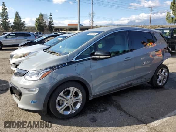 2021 Chevrolet Bolt EV LT z VIN 1G1FY6S03M4103570, wystawiony jako Copart lot #38637114 z przebiegiem 34 748 mil mil oraz . Historia ofert i sprzedaży dostępna na DreamBid. Obrazek 1.