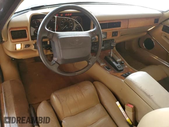 ✅ 1995 Jaguar XJS • VIN: SAJNX2743SC199277 • Лот: 42585325. Опубликован ранее на Copart с пробегом 112 283 миль. Бесплатный доступ к архиву аукционных продаж из США и подробный отчёт об истории автомобиля на DreamBid. Изображение 8.