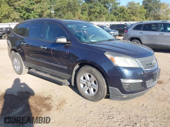 2015 Chevrolet Traverse LS z VIN 1GNKRFEDXFJ275799, wystawiony jako IAAI lot #43404084 z przebiegiem 150 564 mil mil oraz . Historia ofert i sprzedaży dostępna na DreamBid. Obrazek 1.