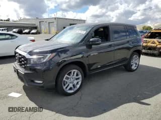 ✅ 2024 Honda Passport EX-L • VIN: 5FNYF8H57RB003573 • Lot: 84820575. Listed on Copart with 12,397 mi. Free auction sales archive from the USA and detailed vehicle history report at DreamBid. Image 1.