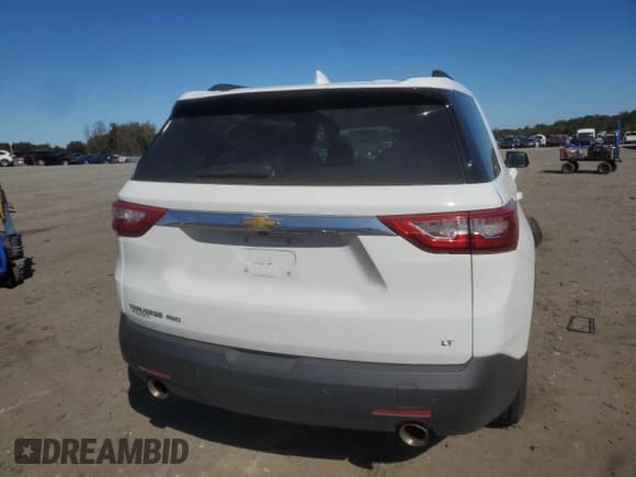 ✅ 2021 Chevrolet Traverse LT Cloth • VIN: 1GNEVGKW9MJ217779 • Lot: 85690295. Listed on Copart with 62,318 mi. Free auction sales archive from the USA and detailed vehicle history report at DreamBid. Image 6.