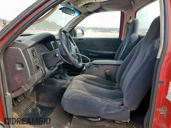 2002 Dodge Dakota Sport z VIN 1B7FL36X72S658963, wystawiony jako Copart lot #57689605 z przebiegiem 306 185 mil mil oraz Czysty tytuł • Clean title. Historia ofert i sprzedaży dostępna na DreamBid. Obrazek 7.