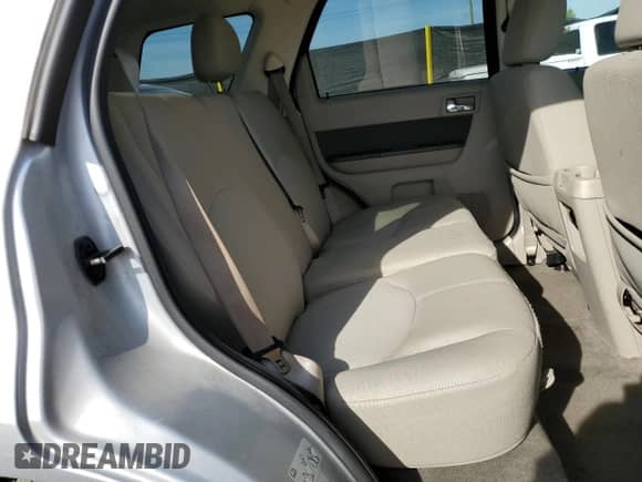 2011 Mercury Mariner with VIN 4M2CN8B78BKJ02364, listed as a Copart auction lot 80027665 with 141,319 mi miles and Salvage title. Bid and sale history available at DreamBid. Image 11.