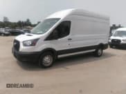 ✅ 2023 Ford Transit Cargo • VIN: 1FTBR2X87PKB02108 • Lot: 42432188. Listed on IAAI with 69,586 mi. Free auction sales archive from the USA and detailed vehicle history report at DreamBid. Image 2.