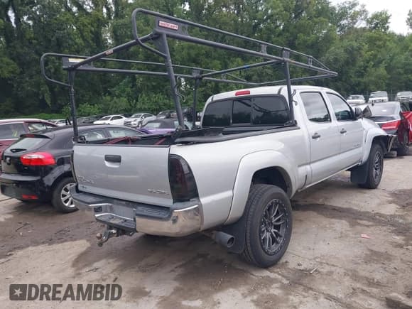 ✅ 2013 Toyota Tacoma • VIN: 3TMMU4FN1DM054202 • Lot: 42871926. Listed on IAAI with 270,648 mi. Free auction sales archive from the USA and detailed vehicle history report at DreamBid. Image 4.