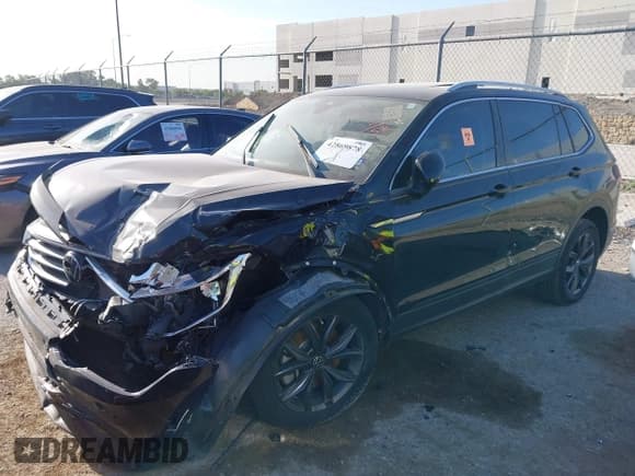 ✅ 2022 Volkswagen Tiguan SE • VIN: 3VV3B7AX7NM161706 • Lot: 42869878. Listed on IAAI with Not provided. Free auction sales archive from the USA and detailed vehicle history report at DreamBid. Image 2.