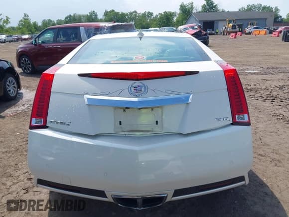 ✅ 2014 Cadillac CTS Performance • VIN: 1G6DG1E36E0124371 • Lot: 42535079. Listed on IAAI with 51,351 mi. Free auction sales archive from the USA and detailed vehicle history report at DreamBid. Image 17.