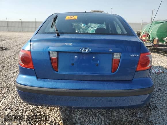 2005 Hyundai Elantra GLS z VIN KMHDN56D05U173782, wystawiony jako Copart lot #62067184 z przebiegiem 174 047 mil mil oraz Szkoda całkowita • Salvage title. Historia ofert i sprzedaży dostępna na DreamBid. Obrazek 6.