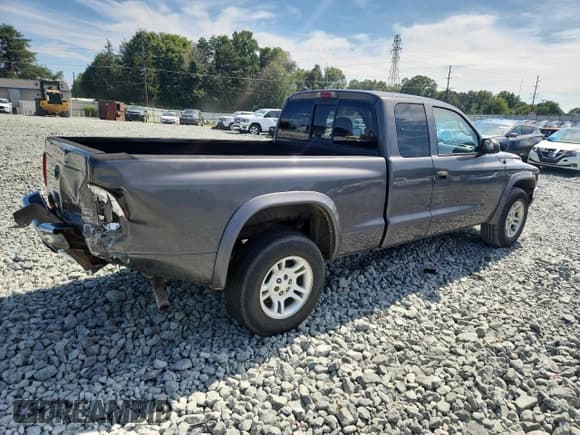 ✅ 2003 Dodge Dakota SLT • VIN: 1D7HL42N53S190029 • Lot: 67090505. Wystawiony na Copart z przebiegiem 129 629 mil. Bezpłatny archiwum sprzedaży aukcyjnych z USA i szczegółowy raport historii pojazdu na DreamBid. Zdjęcie 3.