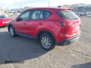 ✅ 2015 Mazda CX-5 Sport • VIN: JM3KE4BY7F0496421 • Lot: 43872102. Listed on IAAI with 119,348 mi. Free auction sales archive from the USA and detailed vehicle history report at DreamBid. Image 3.