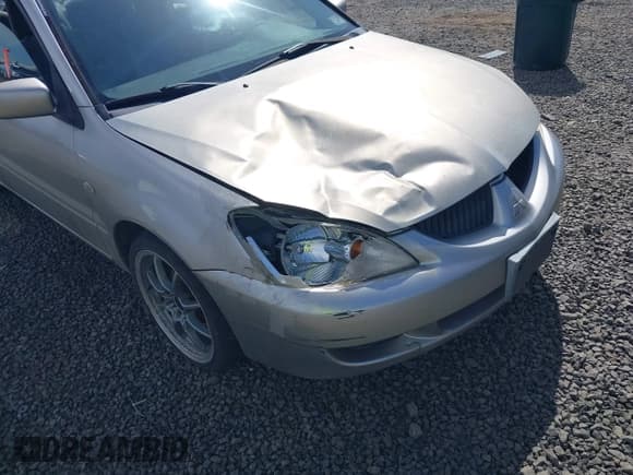 ✅ 2005 Mitsubishi Lancer ES • VIN: JA3AJ26E55U014748 • Lot: 41935566. Listed on IAAI with 255,336 mi. Free auction sales archive from the USA and detailed vehicle history report at DreamBid. Image 6.