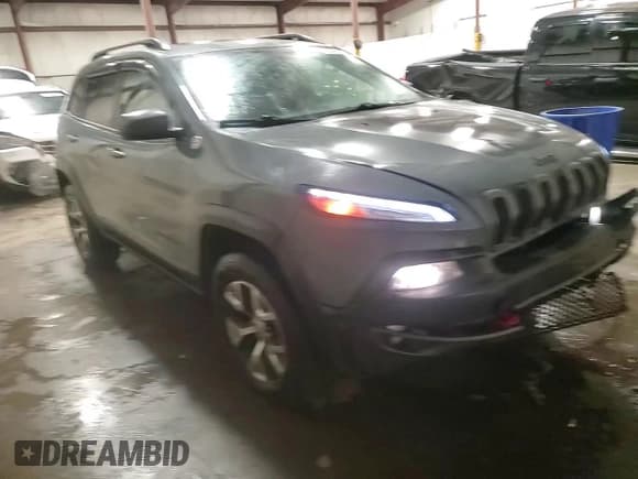 ✅ 2014 Jeep Cherokee Trailhawk • VIN: 1C4PJMBS8EW150380 • Lot: 92049015. Listed on Copart with 90,306 mi. Free auction sales archive from the USA and detailed vehicle history report at DreamBid. Image 14.