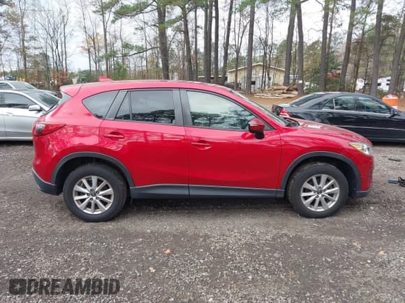 ✅ 2016 Mazda CX-5 Touring • VIN: JM3KE2CY3G0897193 • Lot: 43785978. Listed on IAAI with 119,937 mi. Free auction sales archive from the USA and detailed vehicle history report at DreamBid. Image 13.