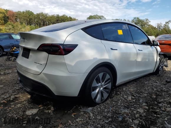 ✅ 2022 Tesla Model Y Long Range • VIN: 7SAYGDEE5NA012941 • Lot: 86692815. Wystawiony na Copart z przebiegiem Nie podano. Bezpłatny archiwum sprzedaży aukcyjnych z USA i szczegółowy raport historii pojazdu na DreamBid. Zdjęcie 3.