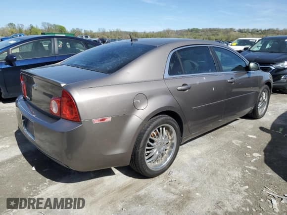 ✅ 2010 Chevrolet Malibu 1LS • VIN: 1G1ZB5EB9AF125885 • Lot: 49283534. Listed on Copart with 87,370 mi. Free auction sales archive from the USA and detailed vehicle history report at DreamBid. Image 3.