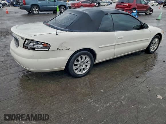 ✅ 2005 Chrysler Sebring GTC • VIN: 1C3EL75R55N549740 • Lot: 93539275. Listed on Copart with 109,011 mi. Free auction sales archive from the USA and detailed vehicle history report at DreamBid. Image 3.